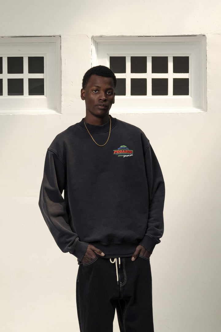 Zwarte crewneck met motorolie-opdruk